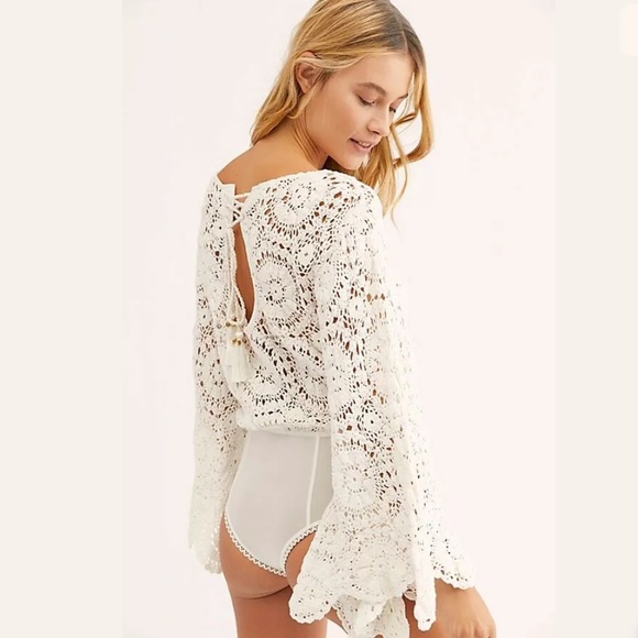 white crochet bodysuit